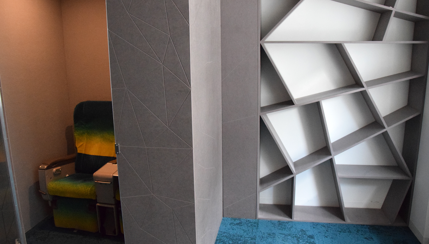 TechQuartier hub — interior with seating and faceted surfaces