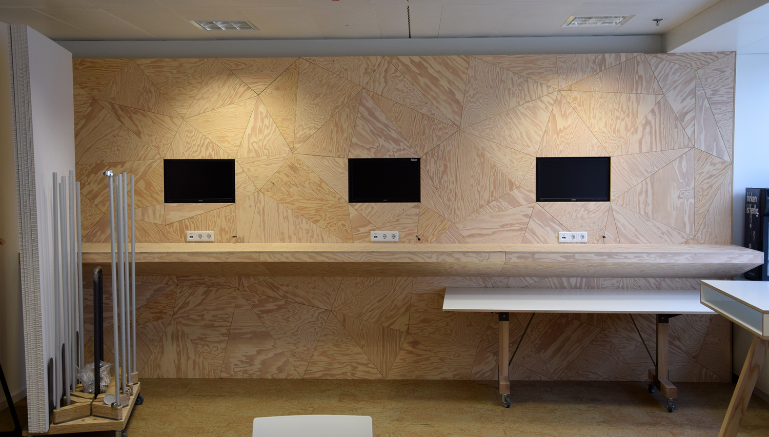 TechQuartier hub — interior with faceted furniture